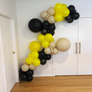 10. "Party Under Construction" - DIY Balloon Garland Kit