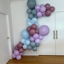 30. "Elsa’s Enchantment" - DIY Balloon Garland Kit