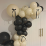 20. "Bow & Balloons" - DIY Balloon Garland Kit