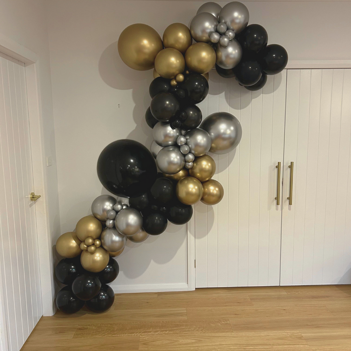 22. "Shimmer & Shadow" - DIY Balloon Garland Kit