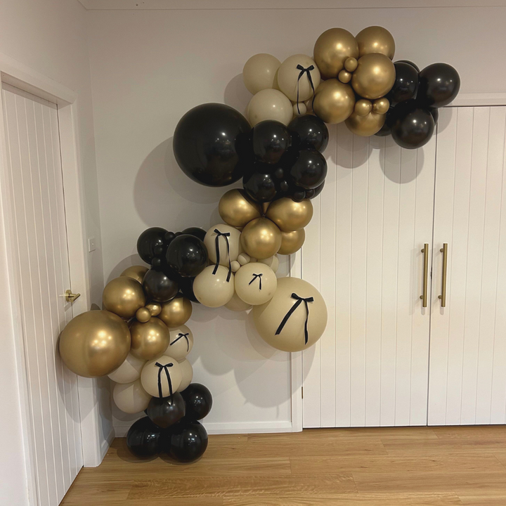 25. "Timeless Ties" - DIY Balloon Garland Kit