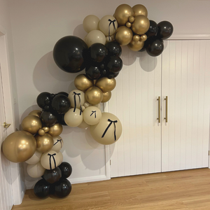 25. "Timeless Ties" - DIY Balloon Garland Kit