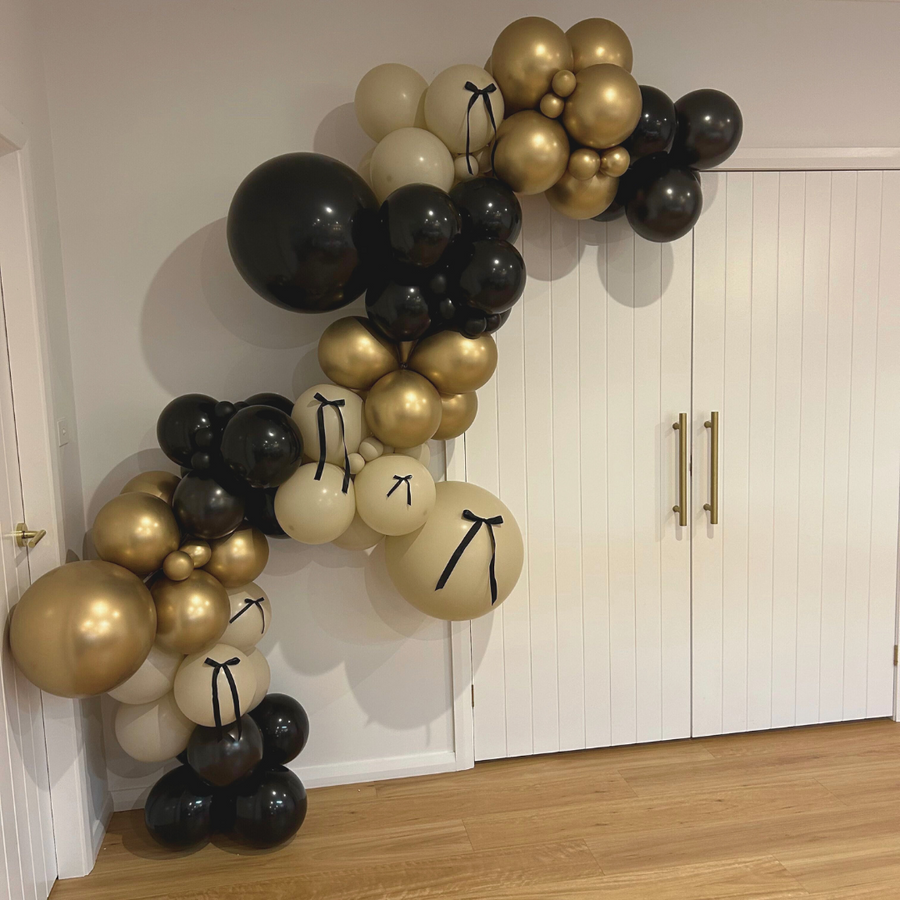 25. "Timeless Ties" - DIY Balloon Garland Kit