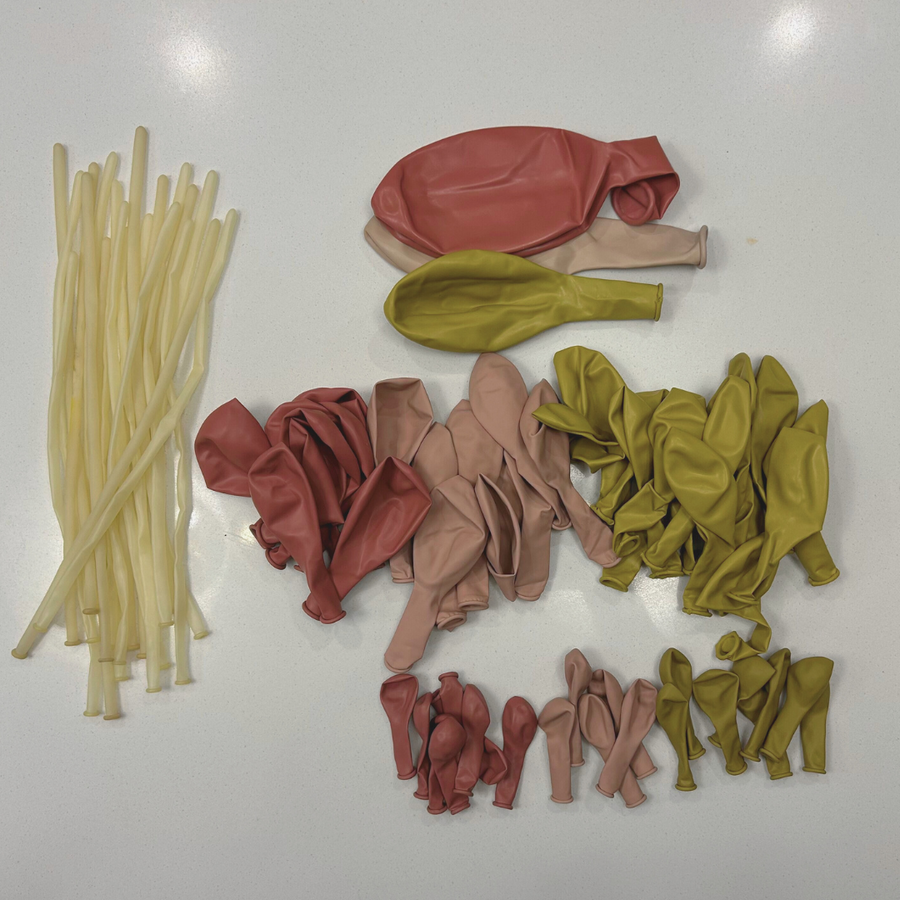 29. "Groovy Vibes" - DIY Balloon Garland Kit